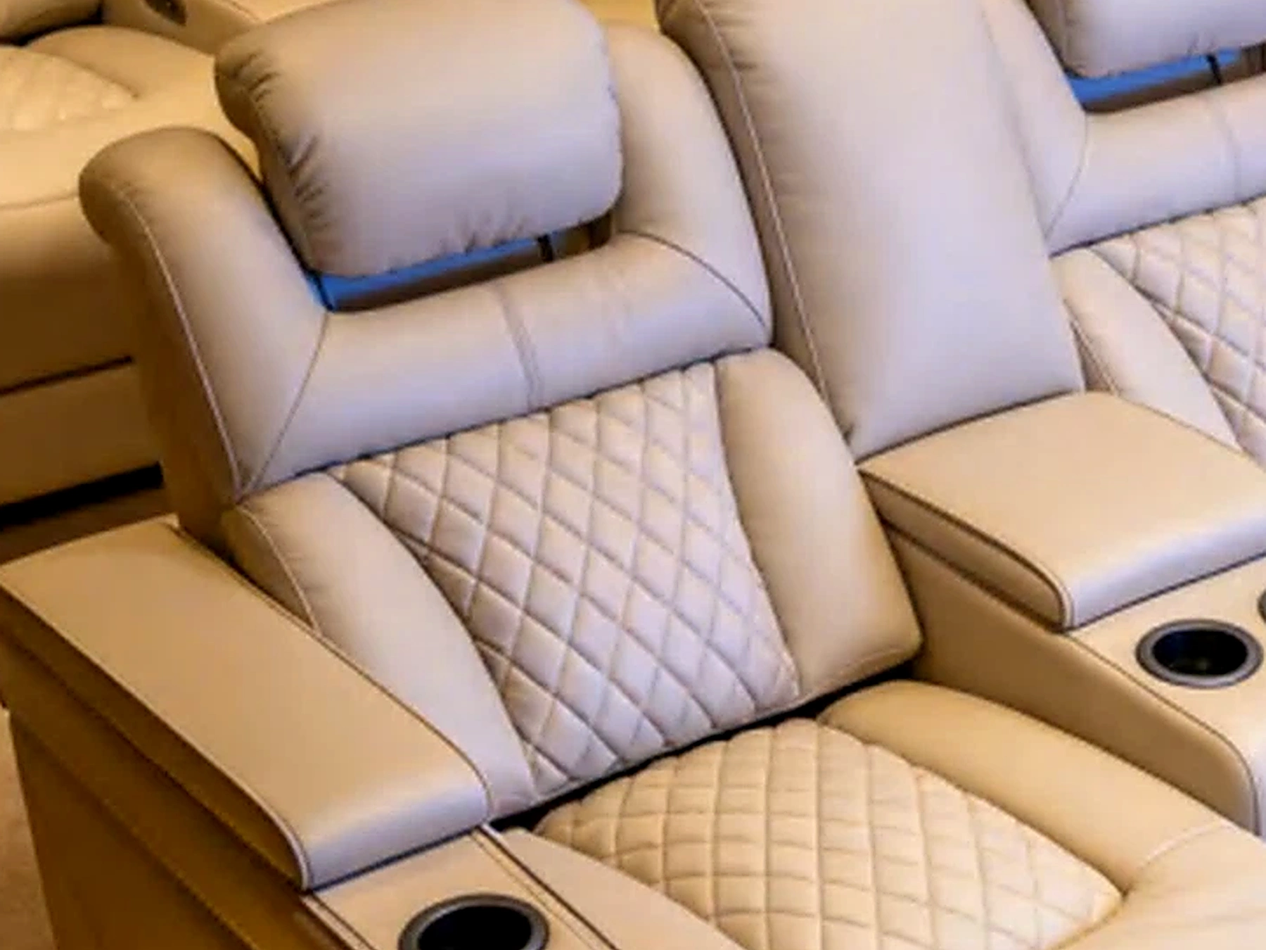 Alabaster Row integrated cupholder and arm detail