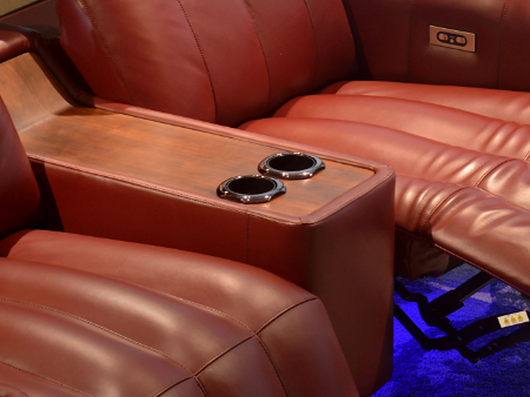 Crown Row arm console and cupholder detail
