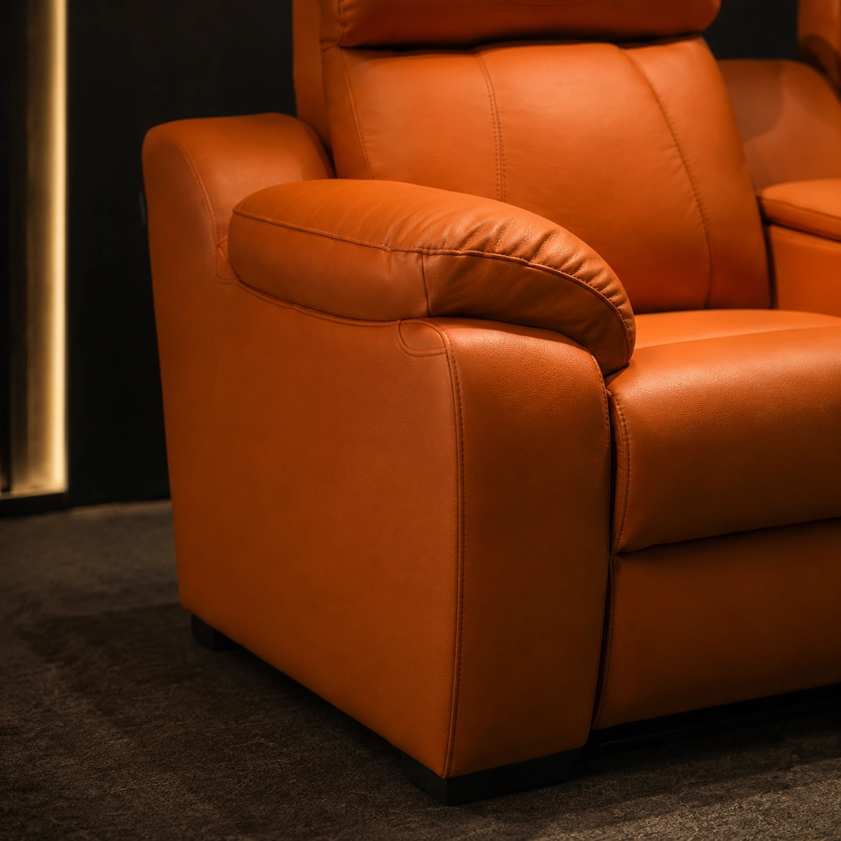 Frame Row broad upholstered arm detail