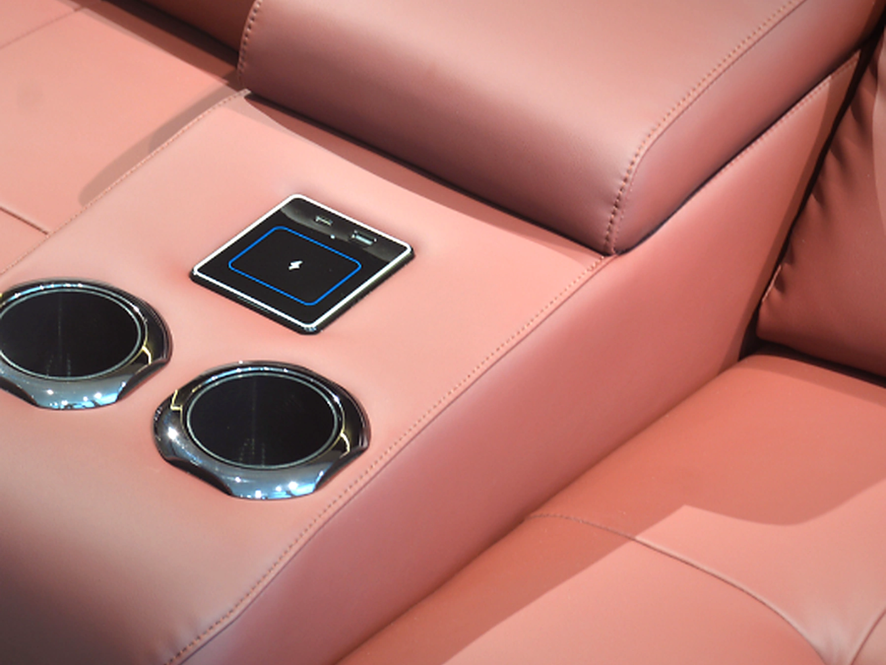 Studio Row dual cupholder and control panel detail
